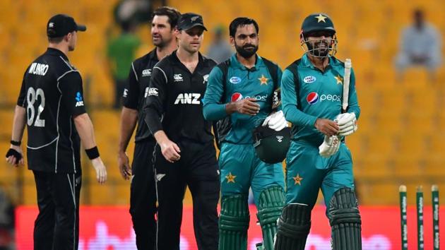 Pakistan cricketers Shadab Khan (R) and Mohammad Hafeez walk back to the pavilion after victory in the second one day international (ODI) cricket match between Pakistan and New Zealand at The Sheikh Zayed Cricket Stadium in Abu Dhabi.(AFP) Pakistan cricketers Shadab Khan (R) and Mohammad Hafeez walk back to the pavilion after victory in the second one day international (ODI) cricket match between Pakistan and New Zealand at The Sheikh Zayed Cricket Stadium in Abu Dhabi.(AFP)