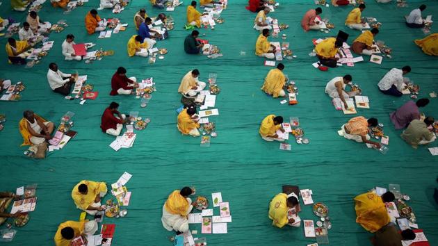 Businessmen pray in front of their record-keeping books as part of a ritual to worship the Hindu deity of wealth goddess Lakshmi in Ahmedabad, Gujarat. (Amit Dave / REUTERS) Businessmen pray in front of their record-keeping books as part of a ritual to worship the Hindu deity of wealth goddess Lakshmi in Ahmedabad, Gujarat. (Amit Dave / REUTERS)