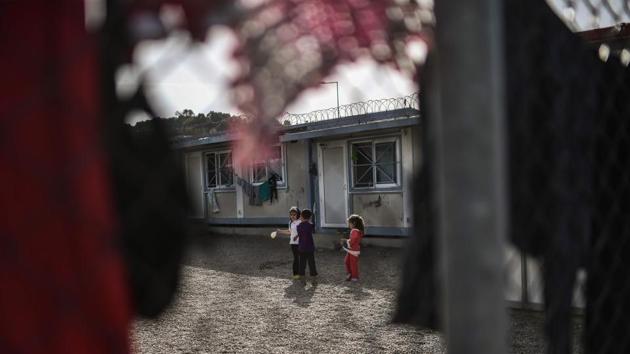 Children stand inside Fylakion detention camp in northern Greece on November 1. (AFP File Photo) Children stand inside Fylakion detention camp in northern Greece on November 1. (AFP File Photo)
