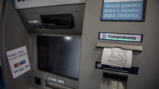 Malfunctioning of most ATMs in Coimbatore Saturday put people to hardship as they were left without cash. (Representtative Image/Bloomberg) Malfunctioning of most ATMs in Coimbatore Saturday put people to hardship as they were left without cash. (Representtative Image/Bloomberg)