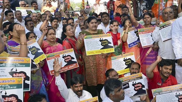 BJP Party leaders and workers raise slogans against the State Government as they oppose the celebration of ‘Tipu Jayanti’, in Bengaluru. The decision of Karnataka chief minister HD Kumaraswamy and his deputy G Parameshwara to skip government-sponsored Tipu Sultan Jayanti celebrations has drawn sharp attack from the BJP. (PTI) BJP Party leaders and workers raise slogans against the State Government as they oppose the celebration of ‘Tipu Jayanti’, in Bengaluru. The decision of Karnataka chief minister HD Kumaraswamy and his deputy G Parameshwara to skip government-sponsored Tipu Sultan Jayanti celebrations has drawn sharp attack from the BJP. (PTI)