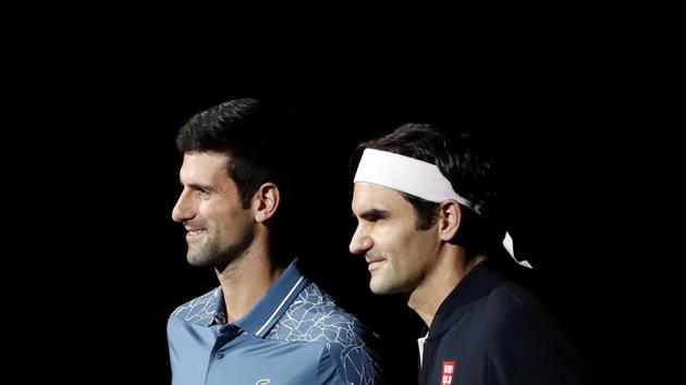 Roger Federer (R) could win 100 titles should he manage to win in London. (AP) Roger Federer (R) could win 100 titles should he manage to win in London. (AP)