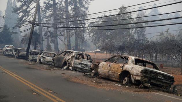 Thursday morning’s evacuation order set off a desperate exodus in which many frantic motorists got stuck in gridlocked traffic. Many abandoned their vehicles to flee on foot as the flames bore down on all sides. “The fire was so close I could feel it in my car through rolled up windows,” said Rita Miller, who fled Paradise with her disabled mother. (Stephen Lam / REUTERS) Thursday morning’s evacuation order set off a desperate exodus in which many frantic motorists got stuck in gridlocked traffic. Many abandoned their vehicles to flee on foot as the flames bore down on all sides. “The fire was so close I could feel it in my car through rolled up windows,” said Rita Miller, who fled Paradise with her disabled mother. (Stephen Lam / REUTERS)