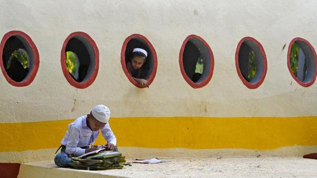 Children study on an airplane replica at Lions Juhu Children's Municipal Park in Mumbai, Maharashtra. (Satyabrata Tripathy / HT Photo) Children study on an airplane replica at Lions Juhu Children's Municipal Park in Mumbai, Maharashtra. (Satyabrata Tripathy / HT Photo)