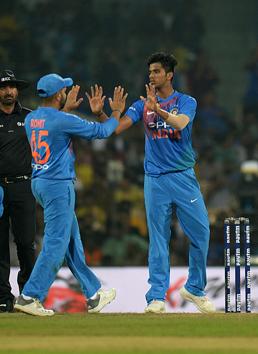 Indian T20 cricket captain Rohit Sharma (L) and Washington Sundar (L) celebrate after taking the wicket of West Indies cricketer Danesh Ramdin during the third T20 cricket match between India and West Indies at the M.A. Chidambaram Cricket Stadium in Chennai. (AFP) Indian T20 cricket captain Rohit Sharma (L) and Washington Sundar (L) celebrate after taking the wicket of West Indies cricketer Danesh Ramdin during the third T20 cricket match between India and West Indies at the M.A. Chidambaram Cricket Stadium in Chennai. (AFP)