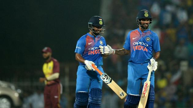 Indian cricketer Rishabh Pant (L), Shikhar Dhawan (R) gestures during the Third T20 cricket match between India and West Indies at the MA Chidambaram Cricket Stadium in Chennai. (AFP) Indian cricketer Rishabh Pant (L), Shikhar Dhawan (R) gestures during the Third T20 cricket match between India and West Indies at the MA Chidambaram Cricket Stadium in Chennai. (AFP)