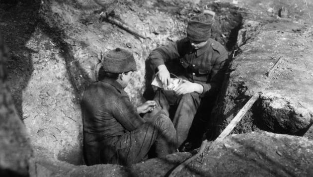 British soldiers making grenades from tins in their trenches, in 1915.(Getty Images) British soldiers making grenades from tins in their trenches, in 1915.(Getty Images)