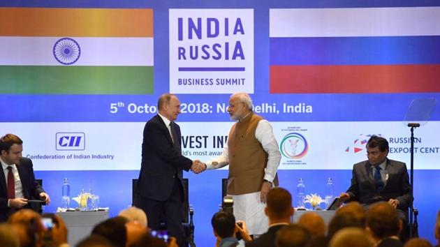 Russian President Vladimir Putin shakes hands with Prime Minister Narendra Modi during a session of the Russian-Indian business summit in New Delhi on October 5. (REUTERS) Russian President Vladimir Putin shakes hands with Prime Minister Narendra Modi during a session of the Russian-Indian business summit in New Delhi on October 5. (REUTERS)