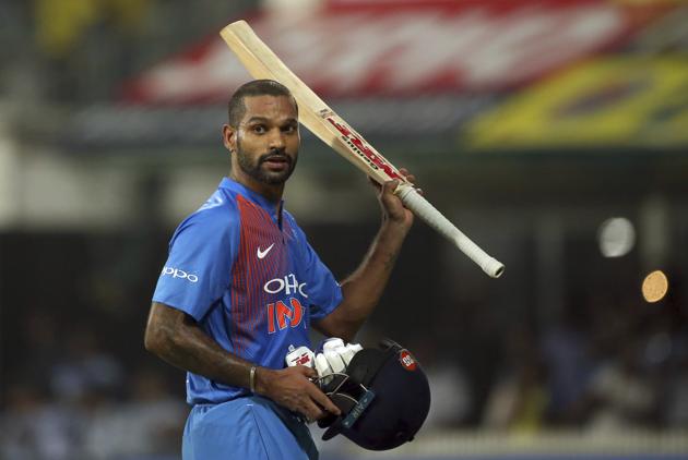 India's Shikhar Dhawan raises his bat to acknowledge the applause from the crowd as he leaves the field after being dismissed during the third and last Twenty20 international cricket match between India and West Indies in Chennai. (AP) India's Shikhar Dhawan raises his bat to acknowledge the applause from the crowd as he leaves the field after being dismissed during the third and last Twenty20 international cricket match between India and West Indies in Chennai. (AP)