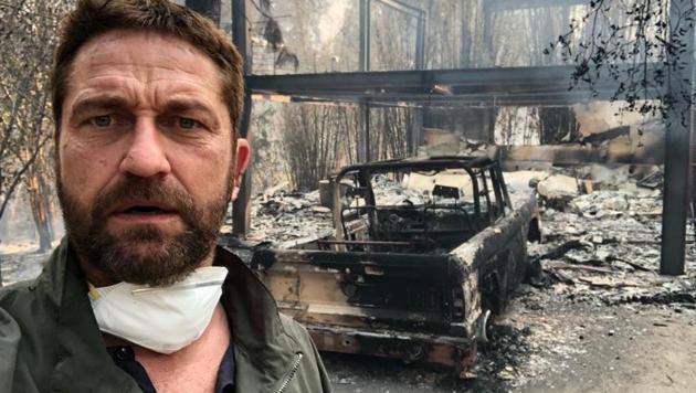 Gerard Butler shared a picture on Instagram with the captain, “Returned to my house in Malibu after evacuating.”(Instagram)
