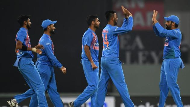 Indian captain Rohit Sharma (R) celebrates with teammates after the wicket of unseen West Indies batsman Fabian Allen during the second T20 cricket match between India and West Indies (AFP) Indian captain Rohit Sharma (R) celebrates with teammates after the wicket of unseen West Indies batsman Fabian Allen during the second T20 cricket match between India and West Indies (AFP)