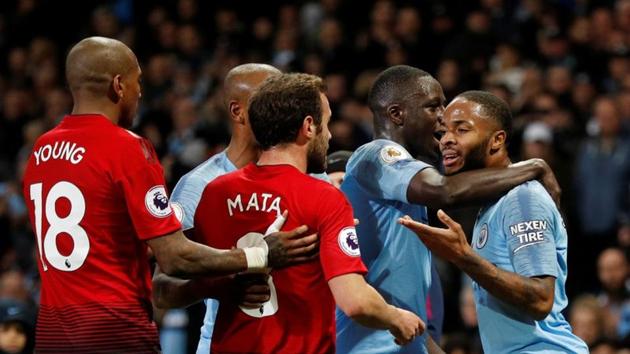 Manchester City's Raheem Sterling (right) clashes with Manchester United's Juan Mata. (REUTERS) Manchester City's Raheem Sterling (right) clashes with Manchester United's Juan Mata. (REUTERS)