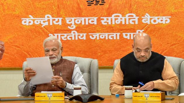 Prime Minister Narendra Modi and BJP President Amit Shah during the party's Central Election Committee meeting for the forthcoming Assembly polls in Rajasthan, at party headquarters in New Delhi, Sunday, Nov 11, 2018. (PTI) Prime Minister Narendra Modi and BJP President Amit Shah during the party's Central Election Committee meeting for the forthcoming Assembly polls in Rajasthan, at party headquarters in New Delhi, Sunday, Nov 11, 2018. (PTI)