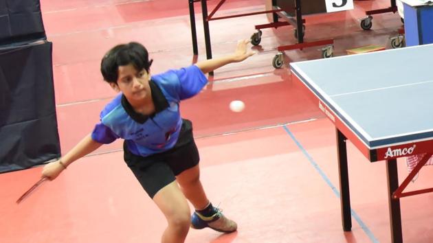 Radhika Sakpal in action at the 49th inter-district and 80th Maharashtra state championship table tennis tournament 2018 at Shree Shiv Chhatrapati Sports complex in Balewadi on Monday.(HT PHOTO)