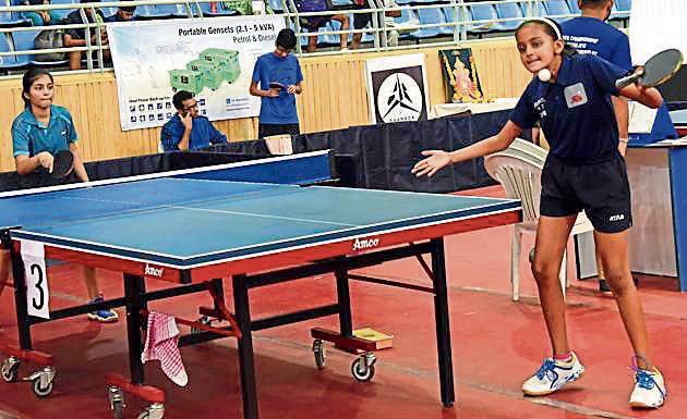 Anandita Lunawat (right) in action against Aarushi Raut of Mumbai suburban district table tennis association at Shree Shiv Chhatrapati sports complex in Balewadi on Tuesday.(HT PHOTO)