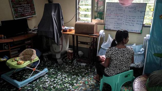 Eight months pregnant, shamed by her family and shunned by the father of her child, Aye Mar --not her real name (pictured) has accepted she will have to give up her baby to an orphanage in Myanmar, a country where single mothers are ostracised and deemed a “disgrace.” Her aunts were “furious” when the 19-year-old told them she had fallen in love with the water delivery boy and become pregnant. (Phyo Hein Kyaw / AFP) Eight months pregnant, shamed by her family and shunned by the father of her child, Aye Mar --not her real name (pictured) has accepted she will have to give up her baby to an orphanage in Myanmar, a country where single mothers are ostracised and deemed a “disgrace.” Her aunts were “furious” when the 19-year-old told them she had fallen in love with the water delivery boy and become pregnant. (Phyo Hein Kyaw / AFP)