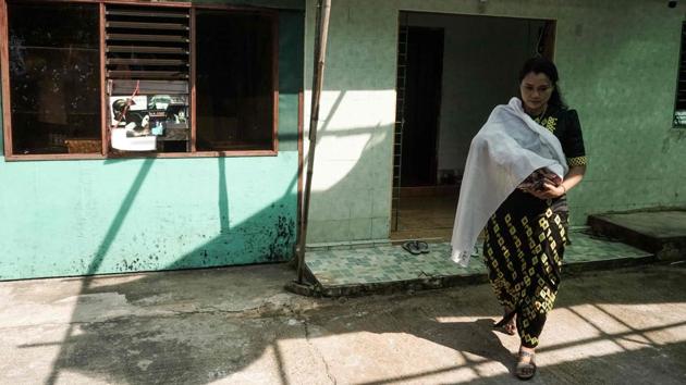 Thant carries a baby at the centre. Although sex education is on the school curriculum teachers often ignore it, while many parents avoid out of embarrassment or a hope that silence offers protection. A group of tech entrepreneurs are hoping an app for young women, brimming with beauty tips, fashion -- and information about reproductive health -- might help educate and break down stigma in the country. (Phyo Hein Kyaw / AFP) Thant carries a baby at the centre. Although sex education is on the school curriculum teachers often ignore it, while many parents avoid out of embarrassment or a hope that silence offers protection. A group of tech entrepreneurs are hoping an app for young women, brimming with beauty tips, fashion -- and information about reproductive health -- might help educate and break down stigma in the country. (Phyo Hein Kyaw / AFP)