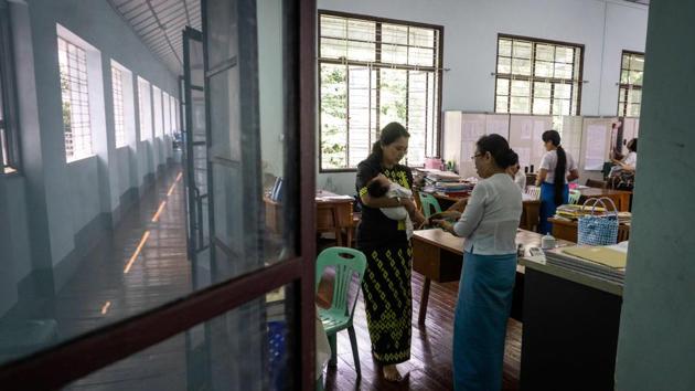 But the majority end up taking their children home, small victories in the battle against conservative values which place the weight of responsibility for unwanted pregnancies on women. “When they get here, they see other people in the same situation as them and they start feeling better about themselves,” said Thant (L). Those who do relinquish their babies are usually forced to do so by their parents or other family members. (Phyo Hein Kyaw / AFP) But the majority end up taking their children home, small victories in the battle against conservative values which place the weight of responsibility for unwanted pregnancies on women. “When they get here, they see other people in the same situation as them and they start feeling better about themselves,” said Thant (L). Those who do relinquish their babies are usually forced to do so by their parents or other family members. (Phyo Hein Kyaw / AFP)