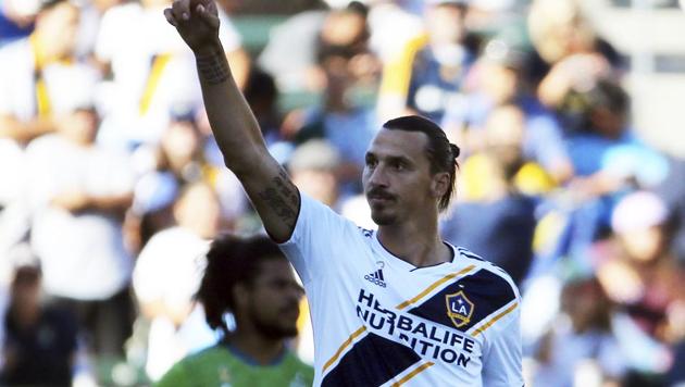 LA Galaxy forward Zlatan Ibrahimovic (9) celebrates his goal against the Seattle Sounders in the first half of an MLS soccer match in Carson, Calif., Sunday, Sept. 23, 2018. The Galaxy won 3-0. (AP) LA Galaxy forward Zlatan Ibrahimovic (9) celebrates his goal against the Seattle Sounders in the first half of an MLS soccer match in Carson, Calif., Sunday, Sept. 23, 2018. The Galaxy won 3-0. (AP)