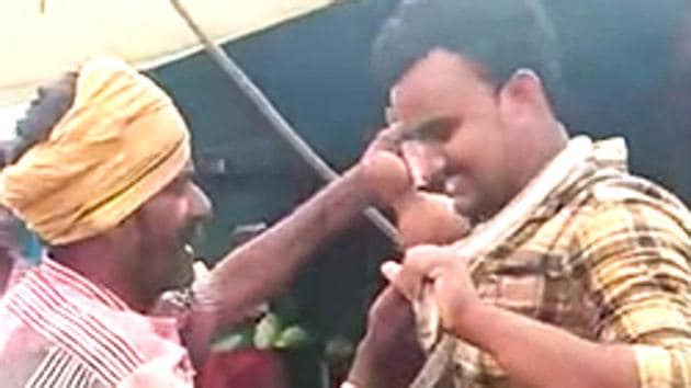 Screen grab of an Andhra man whose attempt for a selfie with a cobra around his neck proved fatal for him (HT)(HT)