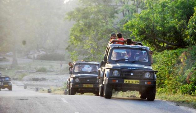 Tourists in Corbett Tiger Reserve in Rampur.(HT File) Tourists in Corbett Tiger Reserve in Rampur.(HT File)