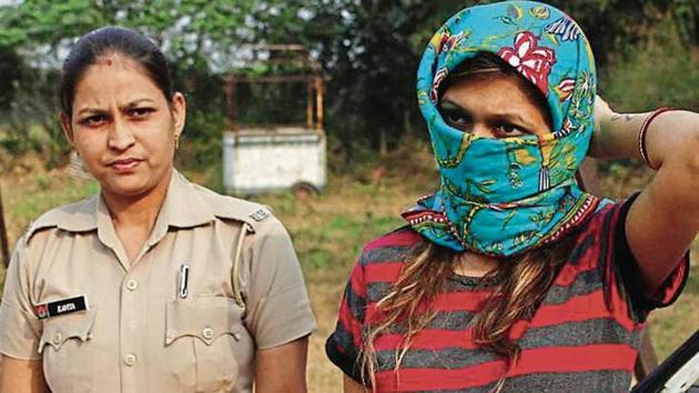 Shefali Bhasin Tewari (in striped Tshirt) was arrested on November 13, 2018, for allegedly conspiring to kill the wife of her lover. (HT Photo) Shefali Bhasin Tewari (in striped Tshirt) was arrested on November 13, 2018, for allegedly conspiring to kill the wife of her lover. (HT Photo)