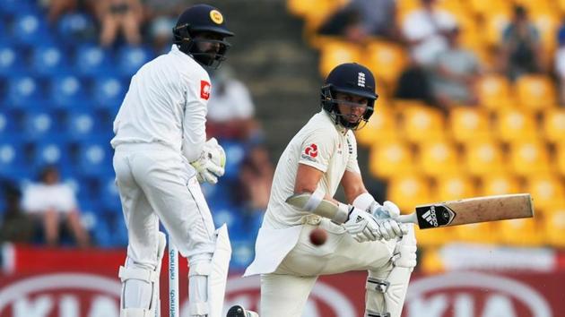 England's Sam Curran (R) hits a boundary next to Sri Lanka's wicket-keeper Niroshan Dickwella. (REUTERS) England's Sam Curran (R) hits a boundary next to Sri Lanka's wicket-keeper Niroshan Dickwella. (REUTERS)