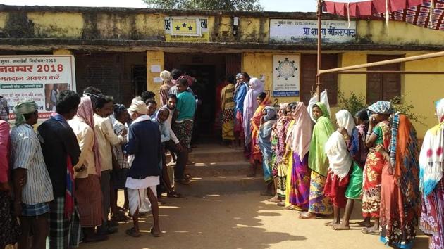 People queue outside a polling station to cast their vote during the first phase of the Chhatisgarh assembly elections at Sukma district on Monday, November 12, 2018. (HT Photo) People queue outside a polling station to cast their vote during the first phase of the Chhatisgarh assembly elections at Sukma district on Monday, November 12, 2018. (HT Photo)