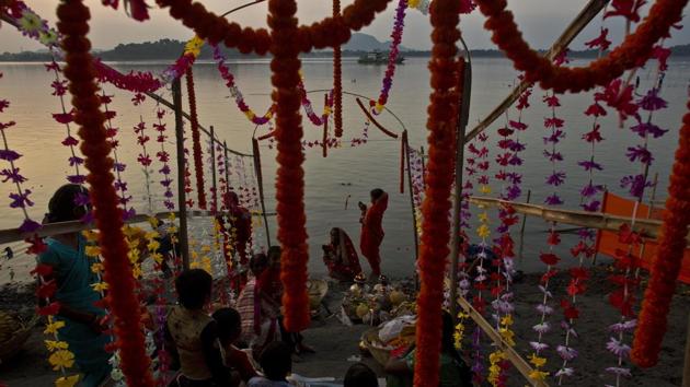 A group of devotees perform rituals in the Brahmaputra river, Guwahati. On the last day, which is the also is known as ‘doosra argha’, devotees offer their prayers to the sun god on the river banks before the sunrise and conclude their fast and eat special prasad and delicacies made for the festival. (Anupam Nath / AP) A group of devotees perform rituals in the Brahmaputra river, Guwahati. On the last day, which is the also is known as ‘doosra argha’, devotees offer their prayers to the sun god on the river banks before the sunrise and conclude their fast and eat special prasad and delicacies made for the festival. (Anupam Nath / AP)