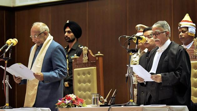 Tripura Governor Prof Kaptan Singh Solanki administers an oath to the newly appointed Chief Justice of Tripura High Court, Justice Sanjay Karol, during a swearing-in-ceremony at Durbar Hall of Raj Bhawan, in Agartala. (PTI) Tripura Governor Prof Kaptan Singh Solanki administers an oath to the newly appointed Chief Justice of Tripura High Court, Justice Sanjay Karol, during a swearing-in-ceremony at Durbar Hall of Raj Bhawan, in Agartala. (PTI)