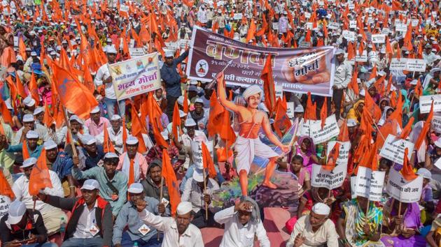People representing various Maharashtrian tribal communities stage a protest against state government for completion of various demands, in Mumbai. (PTI)