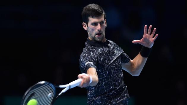 Serbia's Novak Djokovic returns against Germany's Alexander Zverev during their mens singles round-robin match on day four of the ATP World Tour Finals tennis tournament at the O2 Arena in London (AFP) Serbia's Novak Djokovic returns against Germany's Alexander Zverev during their mens singles round-robin match on day four of the ATP World Tour Finals tennis tournament at the O2 Arena in London (AFP)