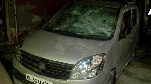 A car and three bikes parked outside AAP leader Jitendra Kumar’s house were damaged in the firing incident that took place on Thursday, November 15, 2018.(Photo Credit: ANI@Twitter)