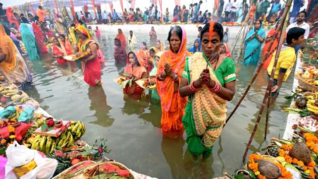 Hindu devotees offer prayers to the sun god during the Chhath festival while standing in a water body at ITO Yamuna Ghat in New Delhi, India. (Amal KS / HT Photo) Hindu devotees offer prayers to the sun god during the Chhath festival while standing in a water body at ITO Yamuna Ghat in New Delhi, India. (Amal KS / HT Photo)