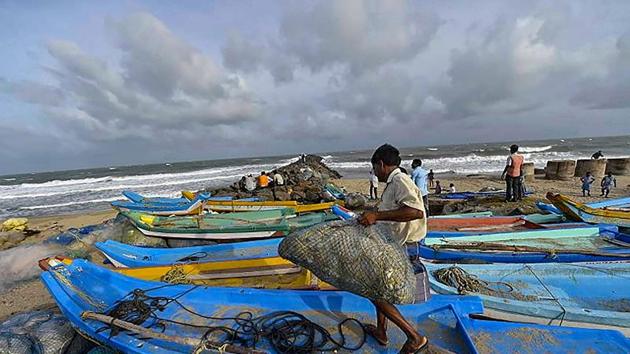 Fishermen dock their boats as a precautionary measure ahead of the arrival of cyclone Gaja, which intensified into a severe cyclonic storm and made landfall in he wee hours of Friday.(PTI)