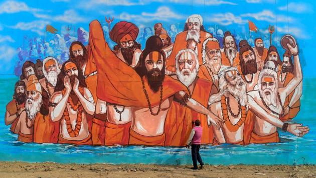 An artist makes a mural painting at a wall of the Naini Central Jail as part of the project 'Paint my City' for the upcoming Kumbh Mela festival in Allahabad, Uttar Pradesh. (PTI) An artist makes a mural painting at a wall of the Naini Central Jail as part of the project 'Paint my City' for the upcoming Kumbh Mela festival in Allahabad, Uttar Pradesh. (PTI)