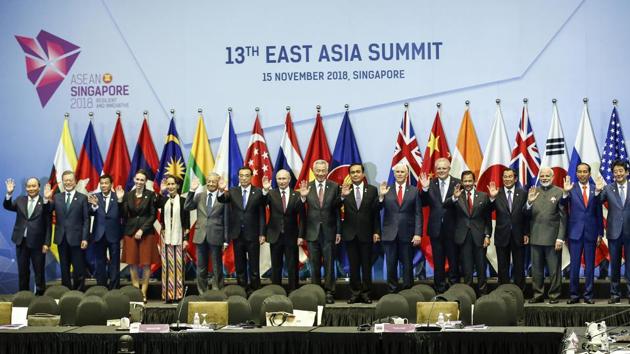 East Asia Summit leaders pose for a group photo during the 13th East Asian Summit Plenary on the sidelines of the 33rd ASEAN summit in Singapore, Thursday, Nov. 15, 2018. From left to right are Vietnam's Nguyen Xuan Phuc, South Korea's Moon Jae-in, Philippines' Rodrigo Duterte, New Zealand's Jacinda Ardern, Myanmar's Aung San Suu Kyi, Malaysia's Mahathir Mohamad, China's Li Keqiang, Russia's Vladimir Putin, Singapore's Lee Hsien Loong, Thailand's Prayuth Chan-ocha, U.S. Vice President Mike Pence, Australia's Scott Morrison, Brunei's Hassanal Bolkiah, Cambodia's Hun Sen, India's Narendra Modi, Indonesia's Joko "Jokowi" Widodo, Japan's Shinzo Abe and Lao's Thongloun Sisoulith. (AP Photo/Yong Teck Lim)(AP) East Asia Summit leaders pose for a group photo during the 13th East Asian Summit Plenary on the sidelines of the 33rd ASEAN summit in Singapore, Thursday, Nov. 15, 2018. From left to right are Vietnam's Nguyen Xuan Phuc, South Korea's Moon Jae-in, Philippines' Rodrigo Duterte, New Zealand's Jacinda Ardern, Myanmar's Aung San Suu Kyi, Malaysia's Mahathir Mohamad, China's Li Keqiang, Russia's Vladimir Putin, Singapore's Lee Hsien Loong, Thailand's Prayuth Chan-ocha, U.S. Vice President Mike Pence, Australia's Scott Morrison, Brunei's Hassanal Bolkiah, Cambodia's Hun Sen, India's Narendra Modi, Indonesia's Joko "Jokowi" Widodo, Japan's Shinzo Abe and Lao's Thongloun Sisoulith. (AP Photo/Yong Teck Lim)(AP)