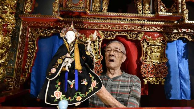 Chen Hsi-huang demonstrates how to use a puppet at the government-funded Puppetry Art Centre in Taipei. At 87 years old, Taiwanese glove puppeteer Chen is the star of a new documentary which reflects his determination to revive the dying traditional craft and a late-life renaissance as a high-profile promoter of the art form. (Sam Yeh / AFP) Chen Hsi-huang demonstrates how to use a puppet at the government-funded Puppetry Art Centre in Taipei. At 87 years old, Taiwanese glove puppeteer Chen is the star of a new documentary which reflects his determination to revive the dying traditional craft and a late-life renaissance as a high-profile promoter of the art form. (Sam Yeh / AFP)