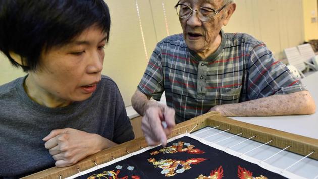 Dozens of students of all ages attend Chen’s classes at the centre every Saturday. Chen acknowledges the challenges facing the ancient craft, saying people have less time to spare to watch the shows. But he has taken heart from the positive response to the documentary which premiered in Taiwan last month, directed by local filmmaker Yang Li-chou over a period of 10 years. (Sam Yeh / AFP) Dozens of students of all ages attend Chen’s classes at the centre every Saturday. Chen acknowledges the challenges facing the ancient craft, saying people have less time to spare to watch the shows. But he has taken heart from the positive response to the documentary which premiered in Taiwan last month, directed by local filmmaker Yang Li-chou over a period of 10 years. (Sam Yeh / AFP)