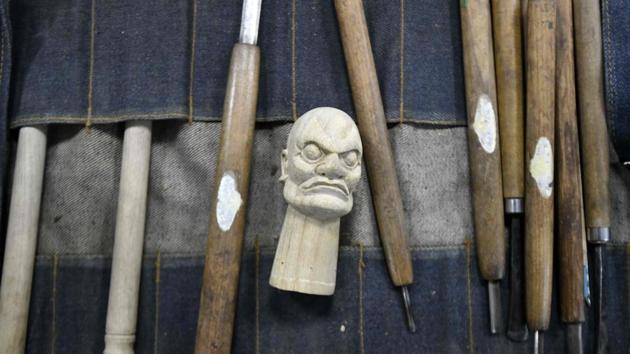 The sculpture tools and a puppet head displayed during the sculpture class. Taiwanese authorities are trying to promote the traditional craft, organising an annual puppet festival in Yunlin county. (Sam Yeh / AFP) The sculpture tools and a puppet head displayed during the sculpture class. Taiwanese authorities are trying to promote the traditional craft, organising an annual puppet festival in Yunlin county. (Sam Yeh / AFP)