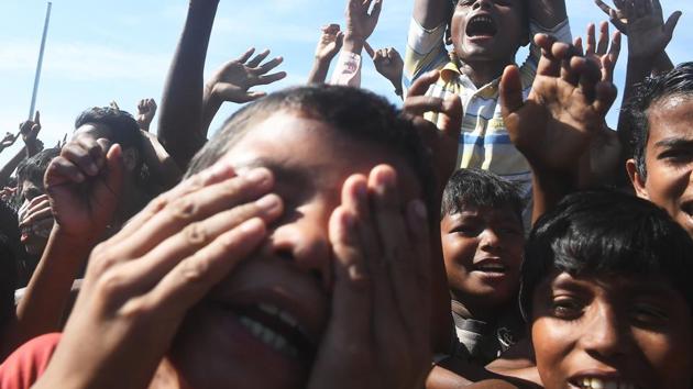 Rohingya refugees shout slogans at a protest against a disputed repatriation programme at the Unchiprang refugee camp near Teknaf on November 15, 2018. (Dibyangshu Sarkar / AFP) Rohingya refugees shout slogans at a protest against a disputed repatriation programme at the Unchiprang refugee camp near Teknaf on November 15, 2018. (Dibyangshu Sarkar / AFP)