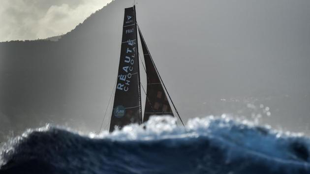 French skipper Armel Tripon sails his Class multi 50 multihull Reaute Chocolat off Pointe-a-Pitre in the French west indies island of Guadeloupe before crossing the finish line in the Route du Rhum solo sailing race on November 15, 2018. (Loic Venance / AFP) French skipper Armel Tripon sails his Class multi 50 multihull Reaute Chocolat off Pointe-a-Pitre in the French west indies island of Guadeloupe before crossing the finish line in the Route du Rhum solo sailing race on November 15, 2018. (Loic Venance / AFP)