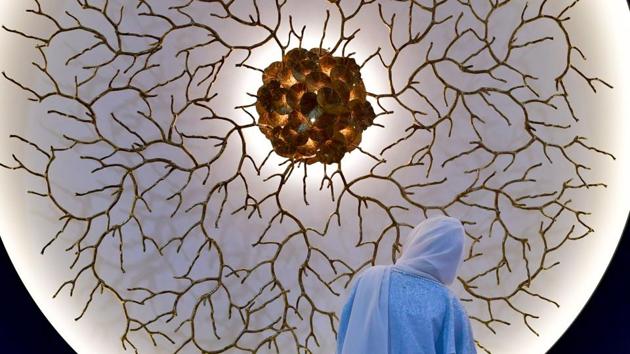 A woman looks at an installation displayed at the Dubai Design Week in the Gulf emirate on November 13, 2018. (Giuseppe Cacace / AFP) A woman looks at an installation displayed at the Dubai Design Week in the Gulf emirate on November 13, 2018. (Giuseppe Cacace / AFP)