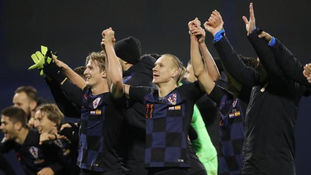 Croatia's Tin Jedvaj, Domagoj Vida and team mates celebrate after the match.(REUTERS)
