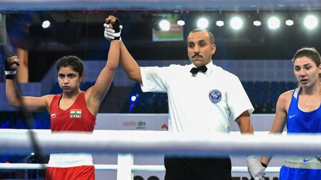 New Delhi: India's Pinki Rani (red) is declared winner against Anush Grigoryan (ARM) in the women's fly 51kg category at the AIBA Women's World Boxing Championships.(PTI)