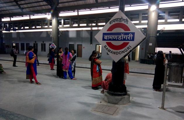 Women commuters wait for a train at the newly inaugurated Bamandongri railway station. They have raised concerns about their safety, especially when they travel at night. (Bachchan Kumar/HT) Women commuters wait for a train at the newly inaugurated Bamandongri railway station. They have raised concerns about their safety, especially when they travel at night. (Bachchan Kumar/HT)