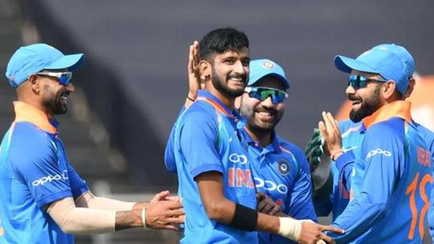File - India bowler Khaleel Ahmed (C) celebrates with captain Virat Kohli (R), Rohit Sharma and Shikhar Dhawan (L) after taking a wicket.(AFP)