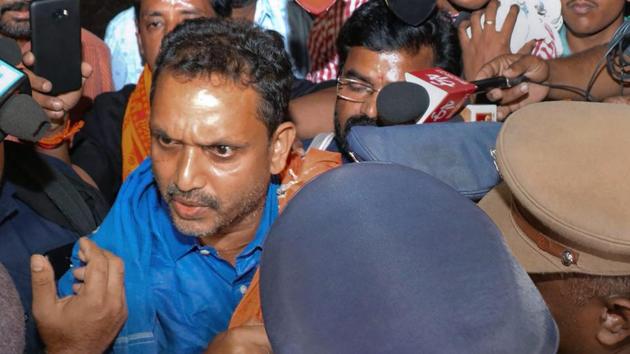 BJP's Kerala state general secretary K Surendran being taken into preventive detention near Sabarimala by the state police when he came to visit Sabarimala on Saturday.(PTI)