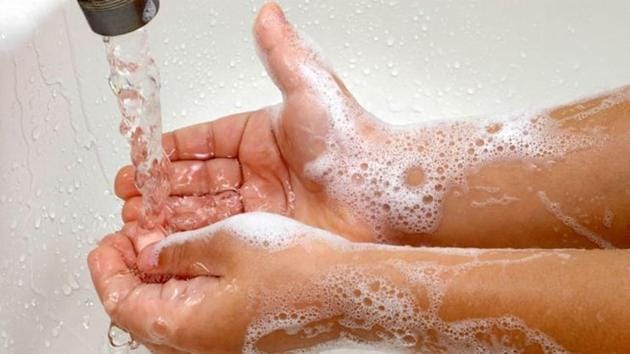 Man Hand Washing Image & Photo (Free Trial)