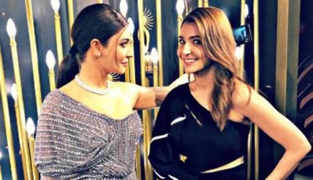 Anushka Sharma poses with her wax statue at Madame Tussauds, Singapore.